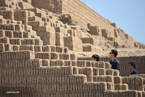 The huge mud brick structure was used for rituals and food storage.

(Photo by Annie Li)