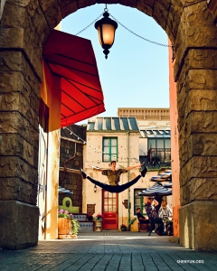 Lights, camera, action! A dancer performs a screen-ready straddle jump at Universal Studios Hollywood.